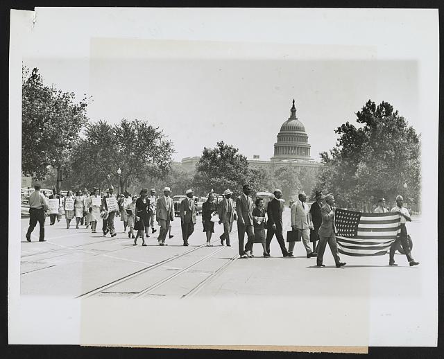 Group marching near the Capitol building in Washington, D.C., to protest the lynching of four African-Americans in Georgia. Courtesy Library of Congress