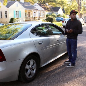 Corinthian Washington, festival organizer, helps direct traffic.