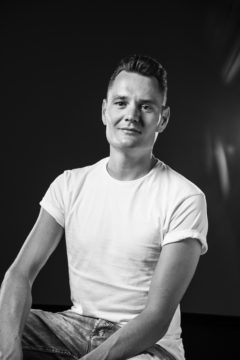 Black and White photograph of Maarten Zwiers wearing a white shirt